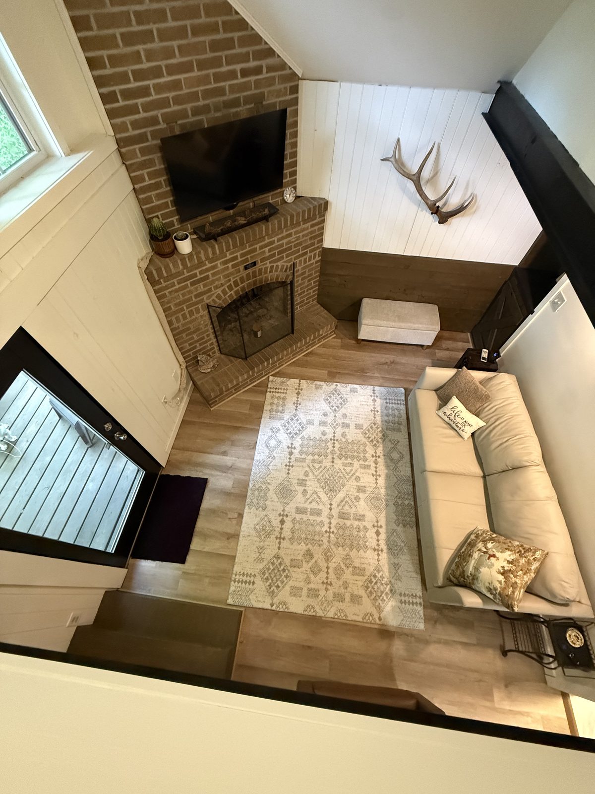 View down from loft to living room